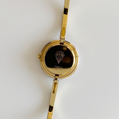 Gucci 1990s Interchangeable Bezel Gold Plated Bangle Watch with 12 bezels, case