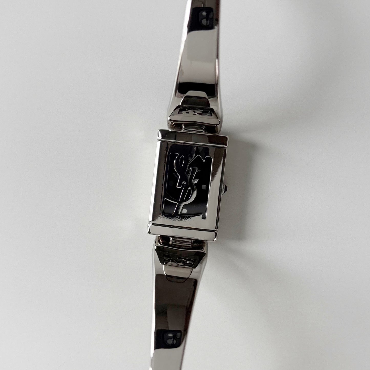 Yves Saint Laurent 1990s Black Dial Silver Bangle Watch