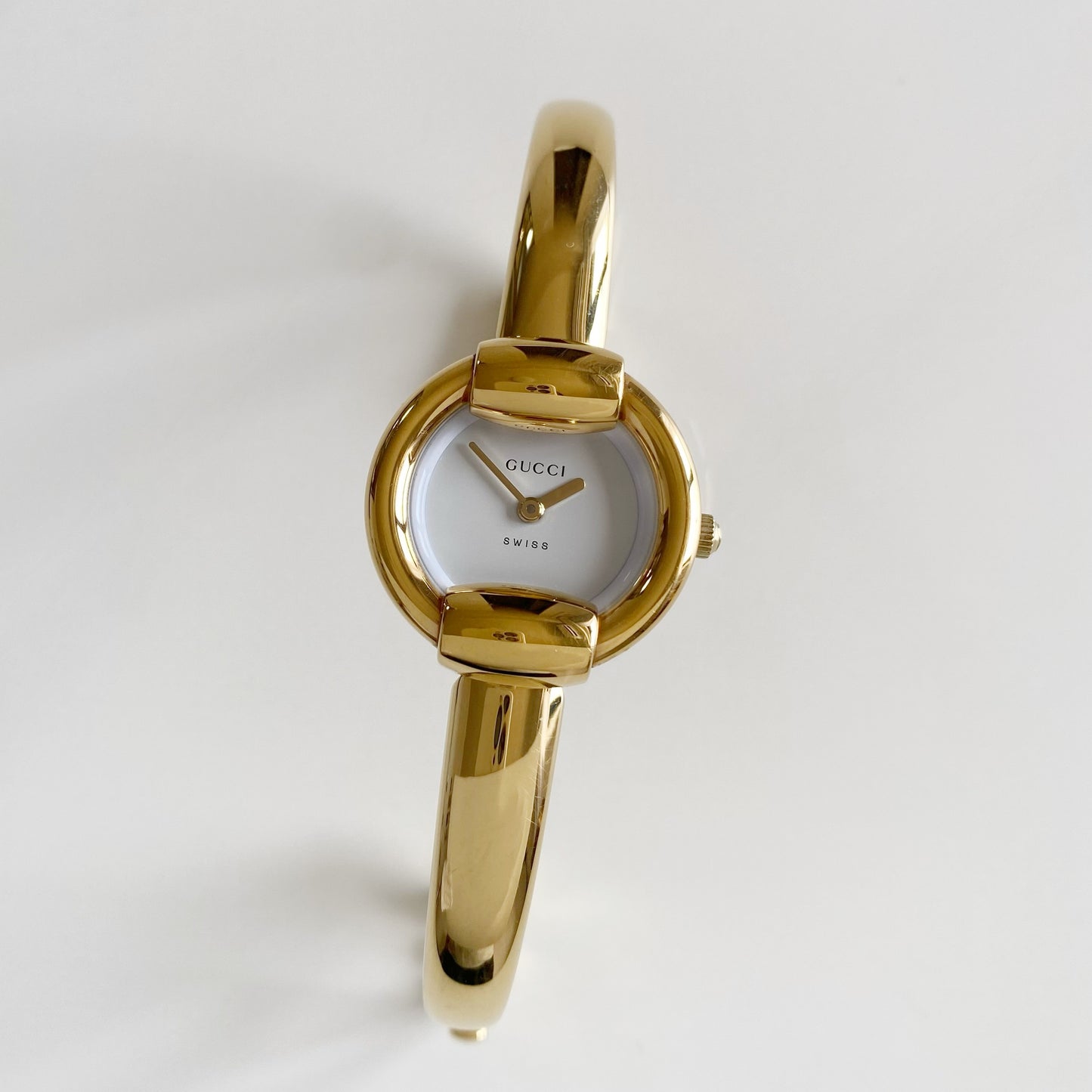 Gucci 1990s Round Dial Gold Plated Bangle Watch