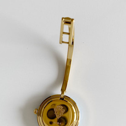 Gucci 1990s Interchangeable Bezel Gold Plated Bangle Watch with 12 bezels, case