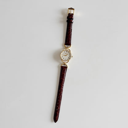 Gucci 1990s Round Dial Gold Plated Horsebit Watch