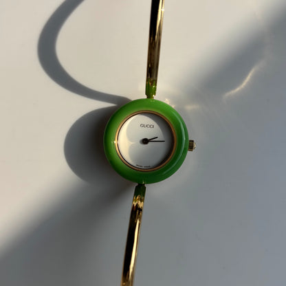Gucci 1990s Interchangeable Bezel Gold Plated Bangle Watch with 12 bezels, case