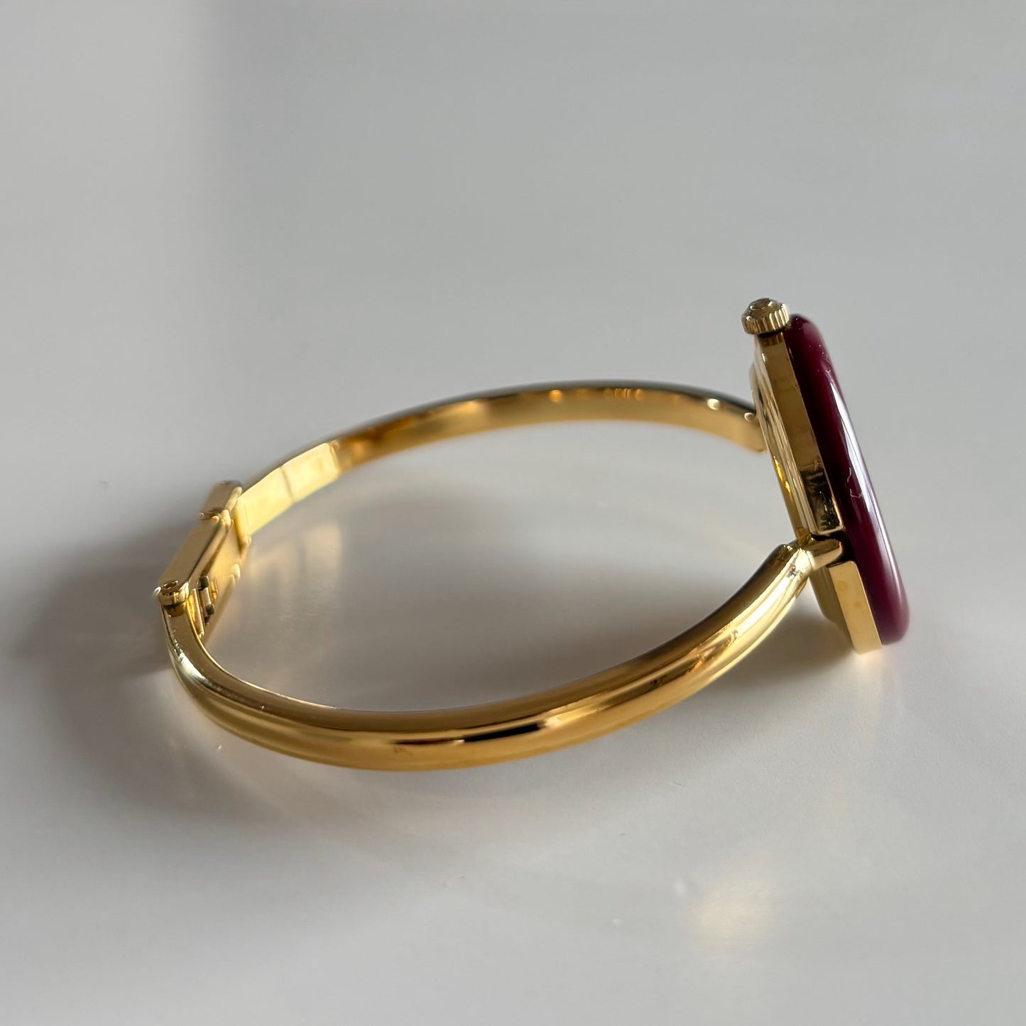 Gucci 1990s Interchangeable Bezel Gold Plated Bangle Watch with 12 bezels, case
