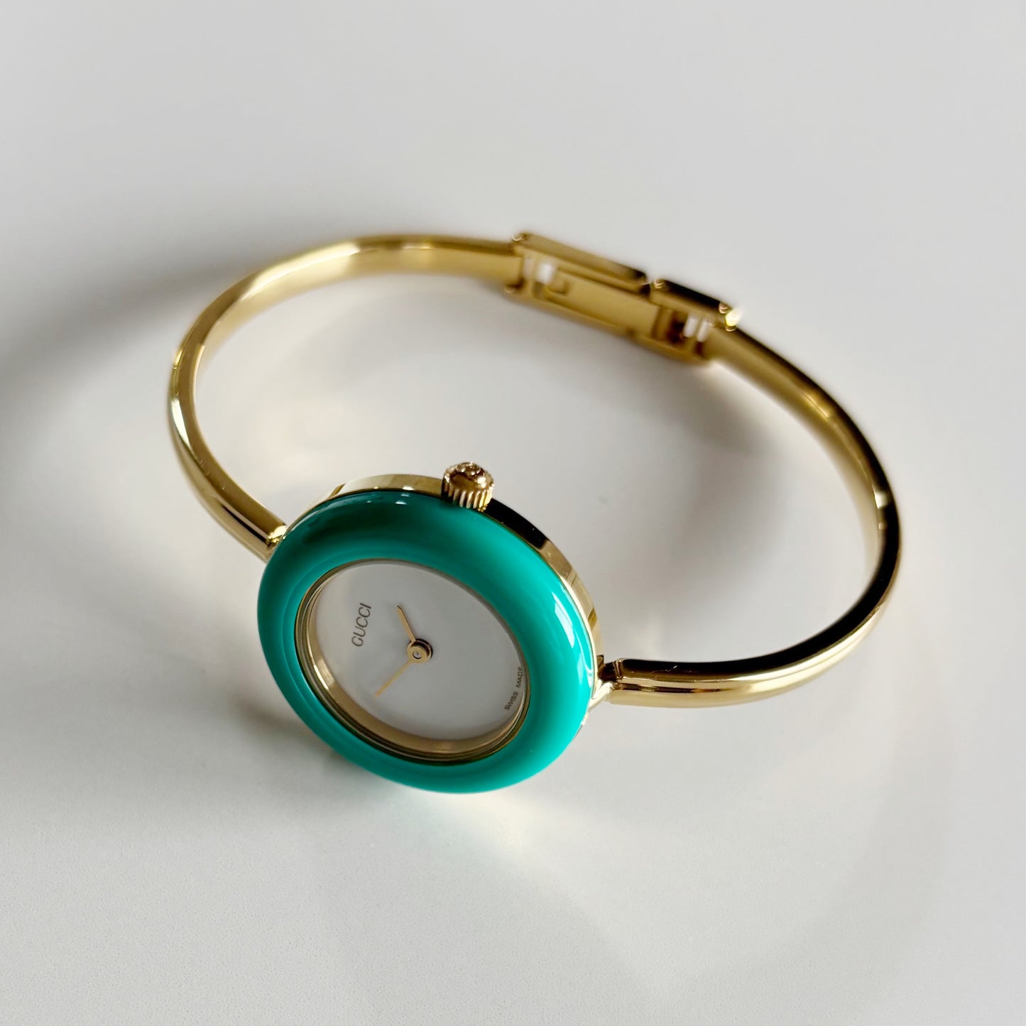 Gucci 1990s Interchangeable Bezel Gold Plated Bangle Watch with 12 bezels, case