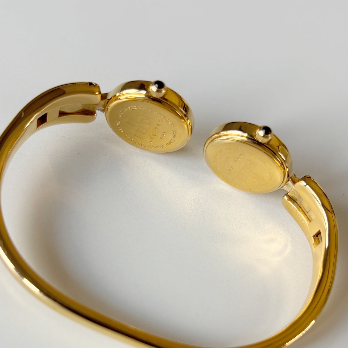 Fendi 1990s Seashell Dial Two Time Zone Gold Plated Bangle Watch
