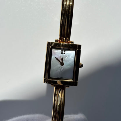 Yves Saint Laurent 1990s Seashell Dial Gold Plated Bangle Watch