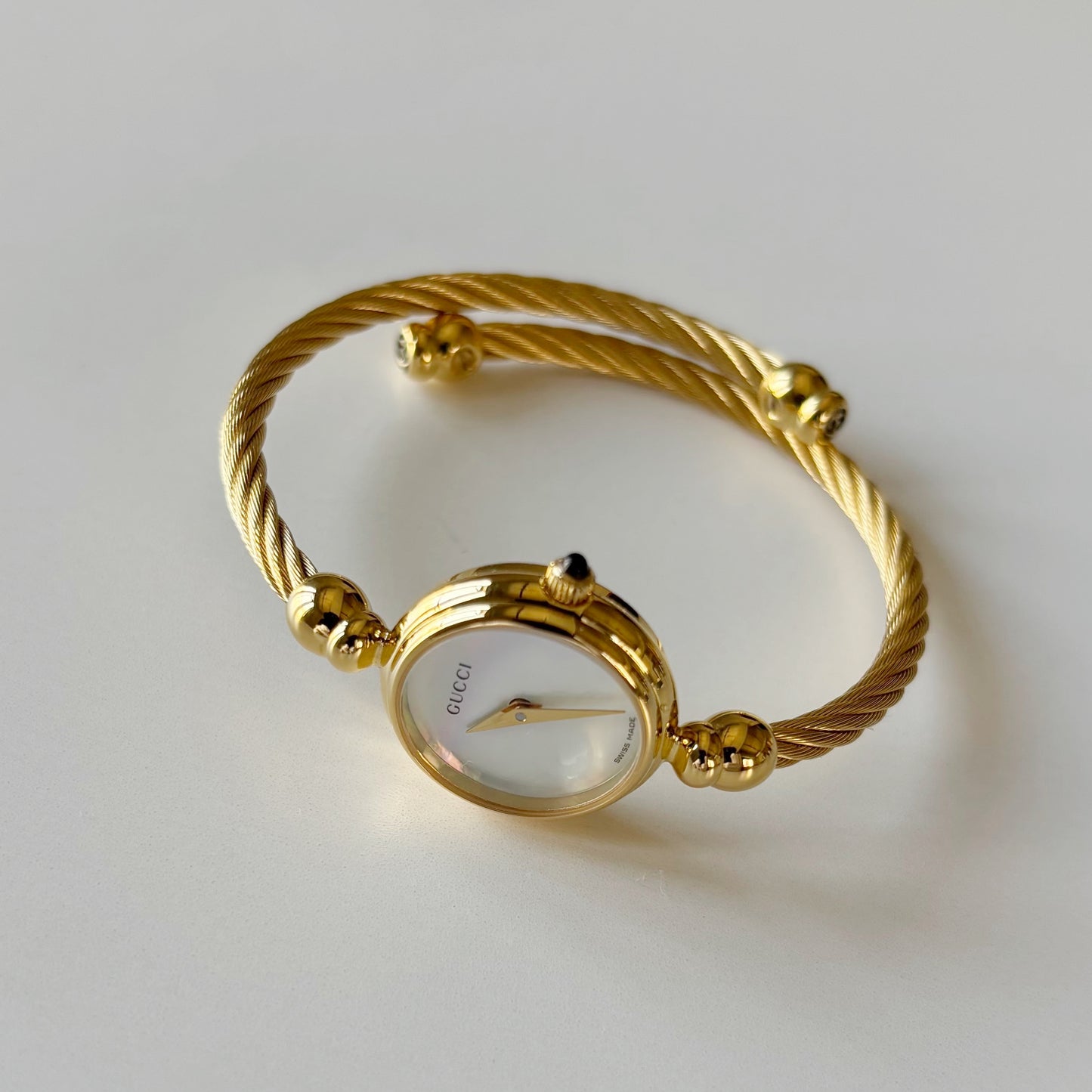 Gucci 1990s Seashell Dial Gold Plated Cable Bangle Watch