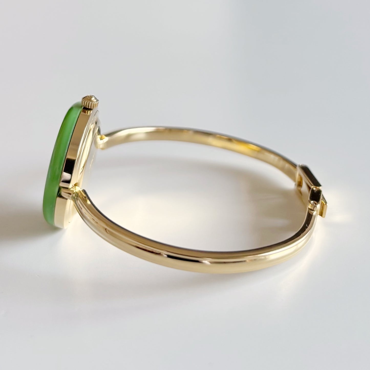 Gucci 1990s Interchangeable Bezel Gold Plated Bangle Watch with 12 bezels, case