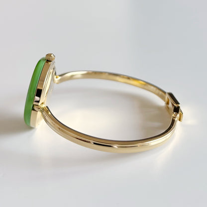 Gucci 1990s Interchangeable Bezel Gold Plated Bangle Watch with 12 bezels, case