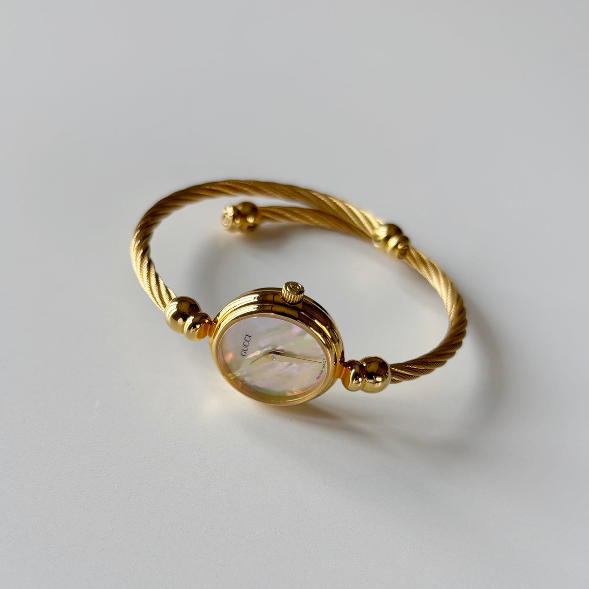 Gucci 1990s Seashell Dial Gold Plated Cable Bangle Watch