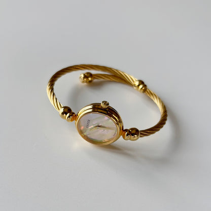 Gucci 1990s Seashell Dial Gold Plated Cable Bangle Watch