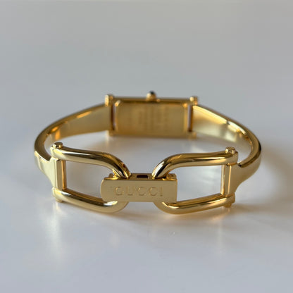 Gucci 1990s Rectangular Gold Dial Gold-Plated Watch