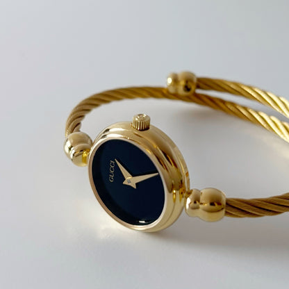 Gucci 1990s Black Dial Gold Plated Cable Bangle Watch