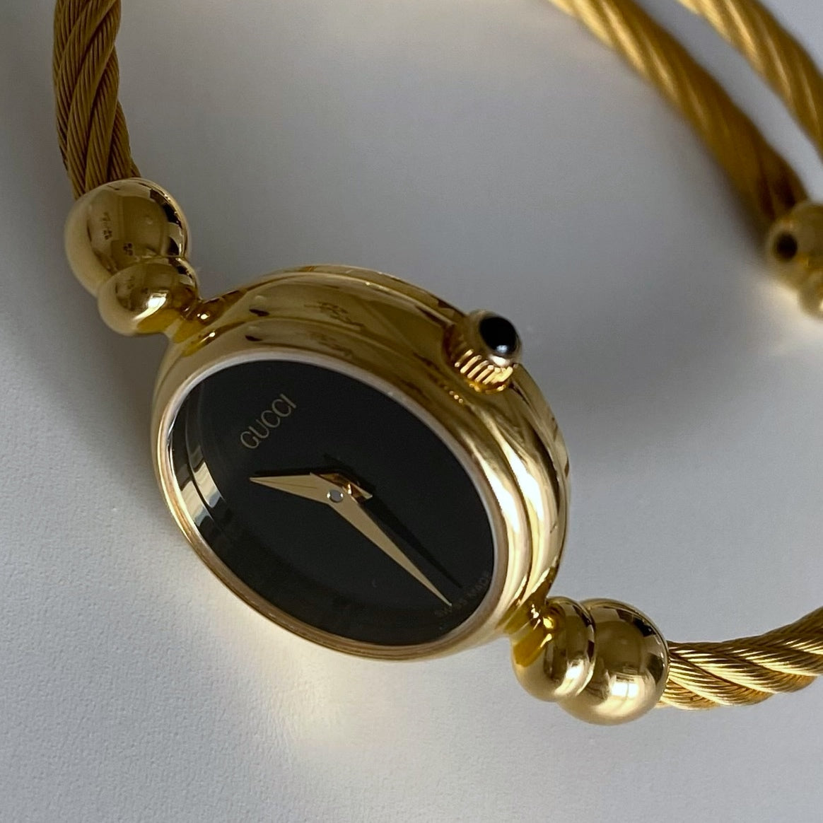 Gucci 1990s Black Dial Gold Plated Bangle Watch