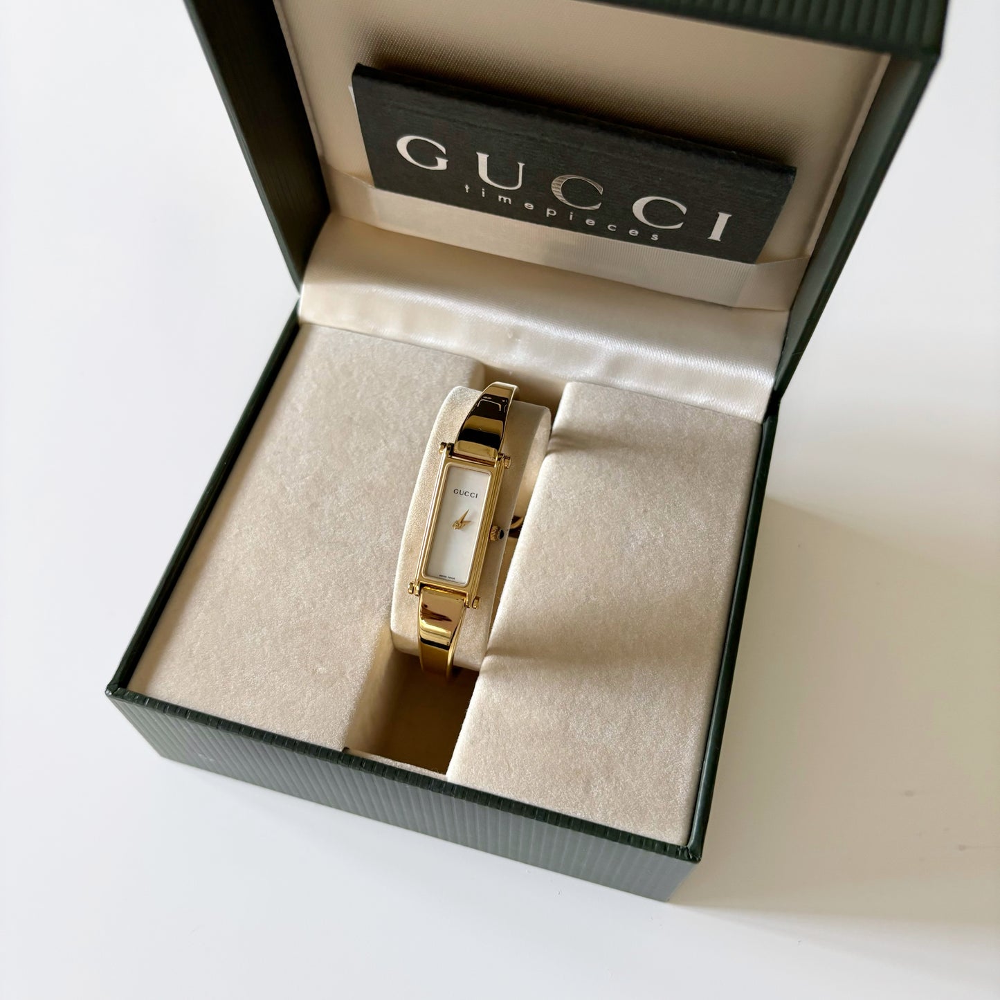 Gucci 1990s Seashell Dial Rectangular Gold Plated Bangle Watch