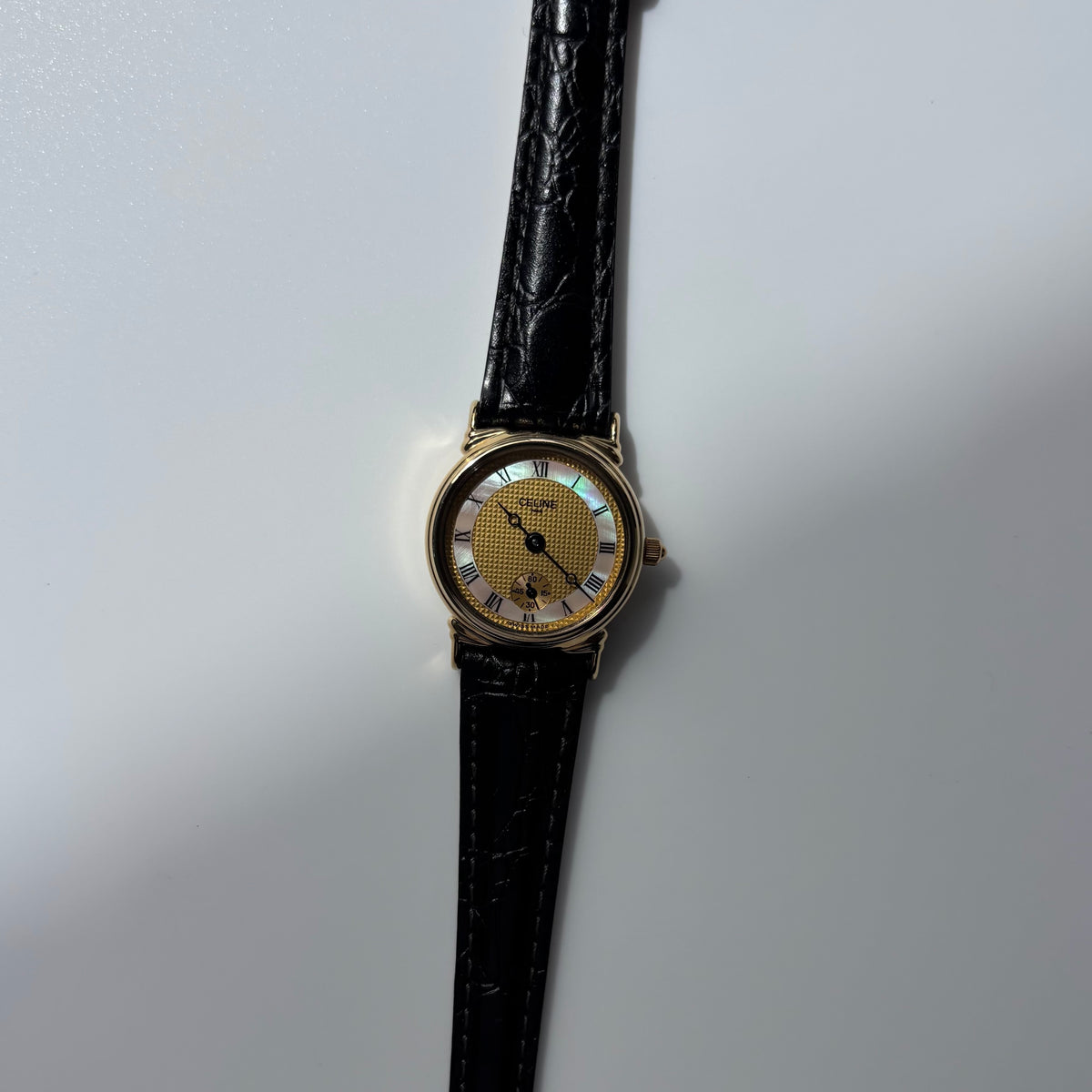Celine 1980s Seashell Round Dial Gold Plated Watch