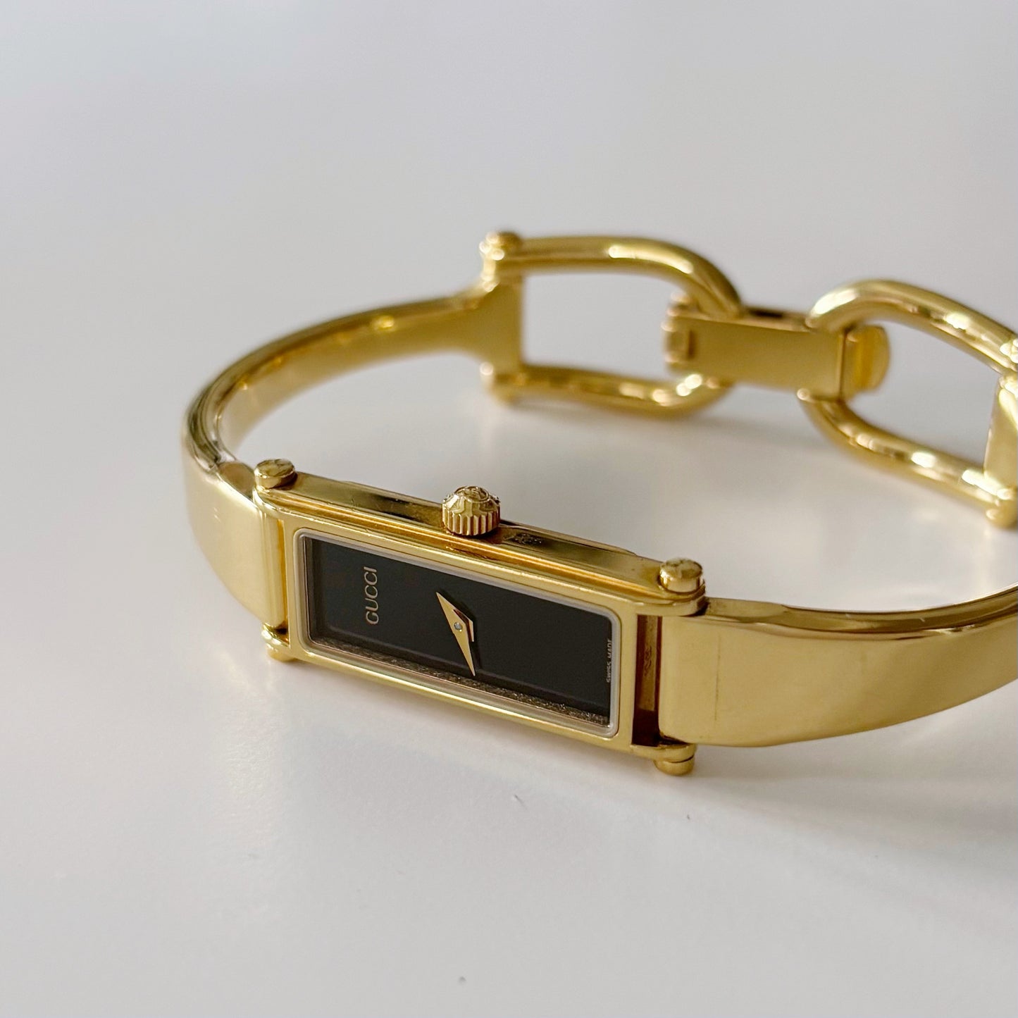 Gucci 1990s Black Dial Gold Plated Bangle Watch