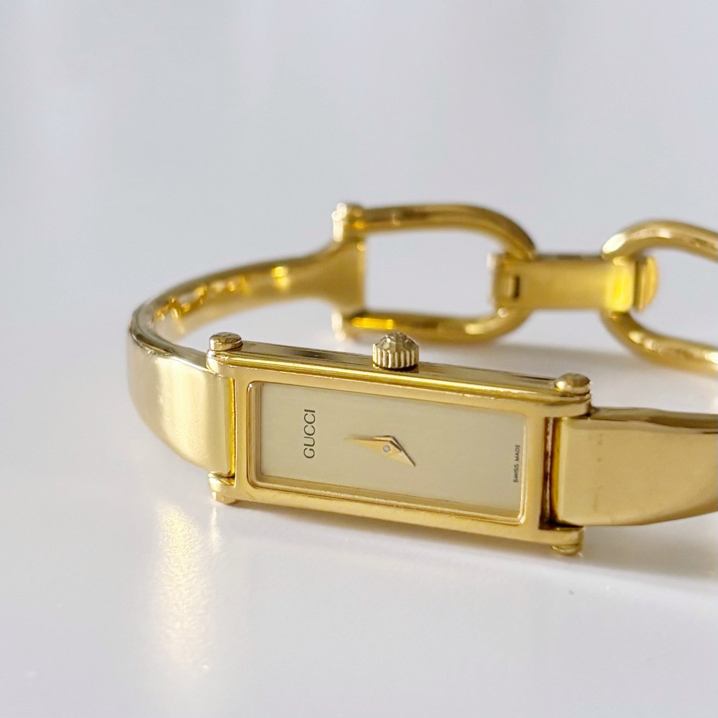 Gucci 1990s Gold Dial Rectangular  Gold Plated Bangle Watch