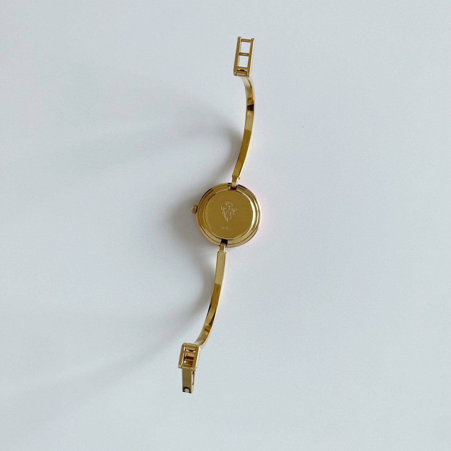 Gucci 1990s Interchangeable Bezel Gold Plated Bangle Watch with 12 bezels, case (Small)