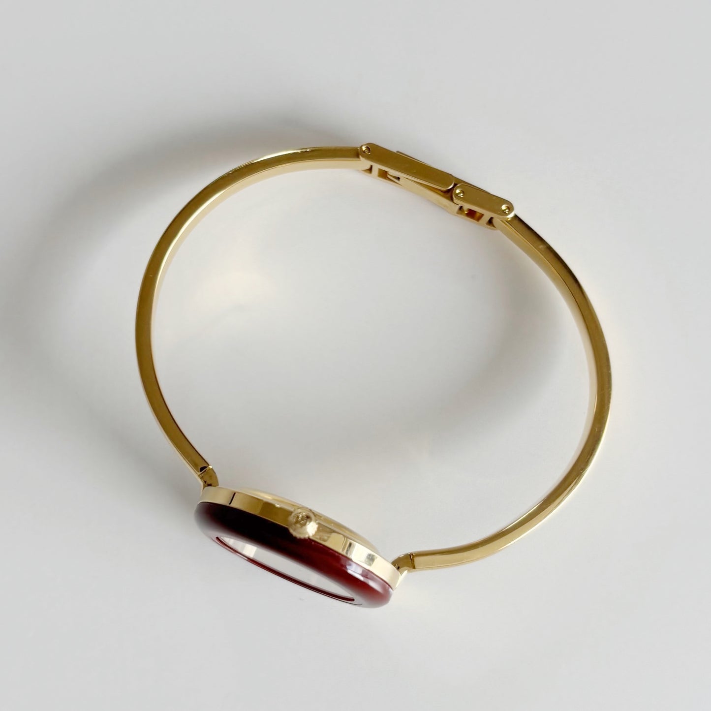 Gucci 1990s Interchangeable Bezel Gold Plated Bangle Watch with 12 bezels, case