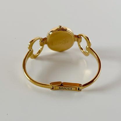 Gucci 1990s Seashell Oval Dial Gold-Plated Bangle Watch (Small)