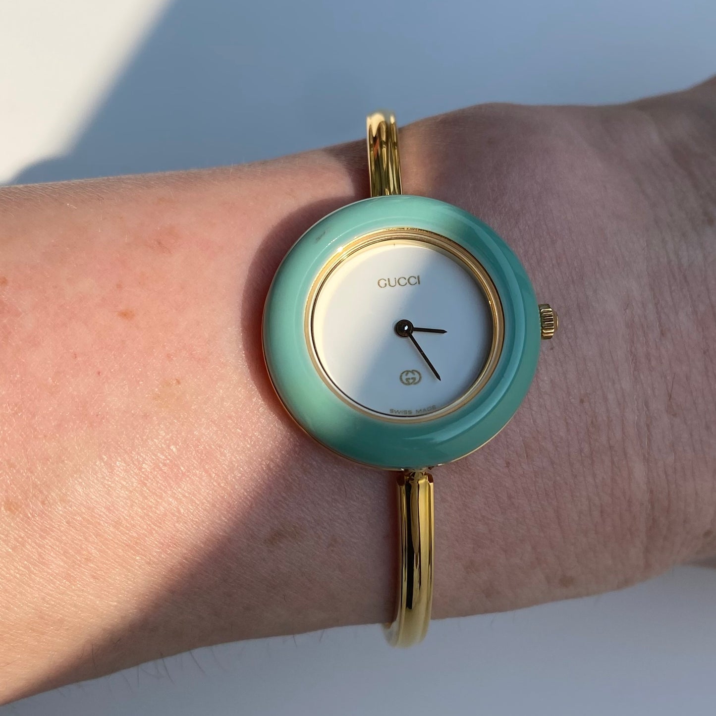 Gucci 1990s Interchangeable Bezel Gold Plated Bangle Watch with 12 bezels, case