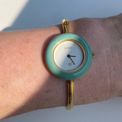 Gucci 1990s Interchangeable Bezel Gold Plated Bangle Watch with 12 bezels, case