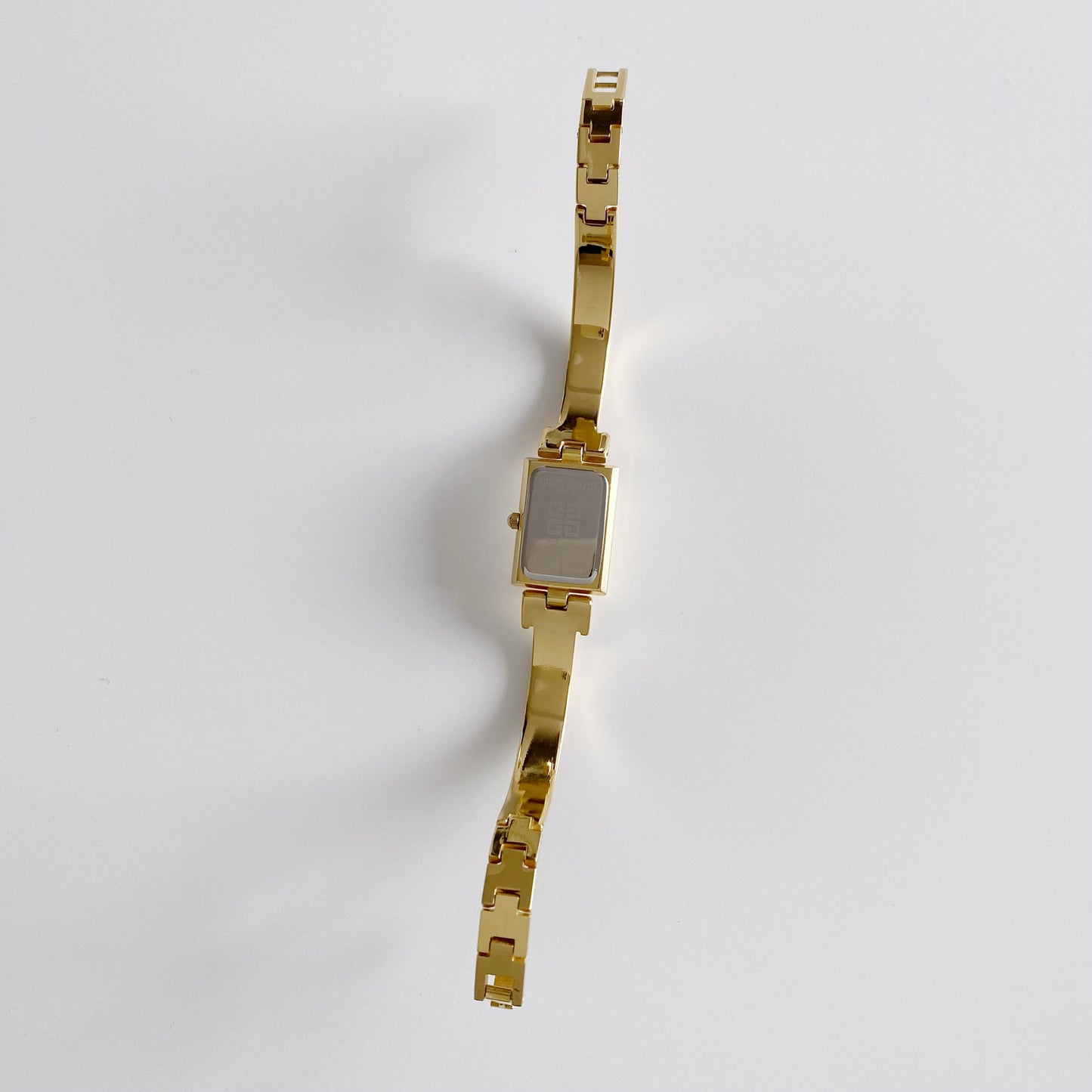 Givenchy 1990s Rectangular Gold Plated Bangle Watch