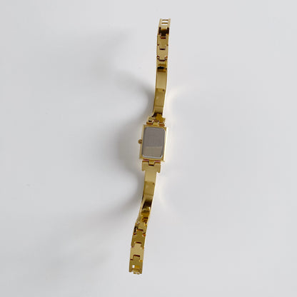 Givenchy 1990s Rectangular Gold Plated Bangle Watch
