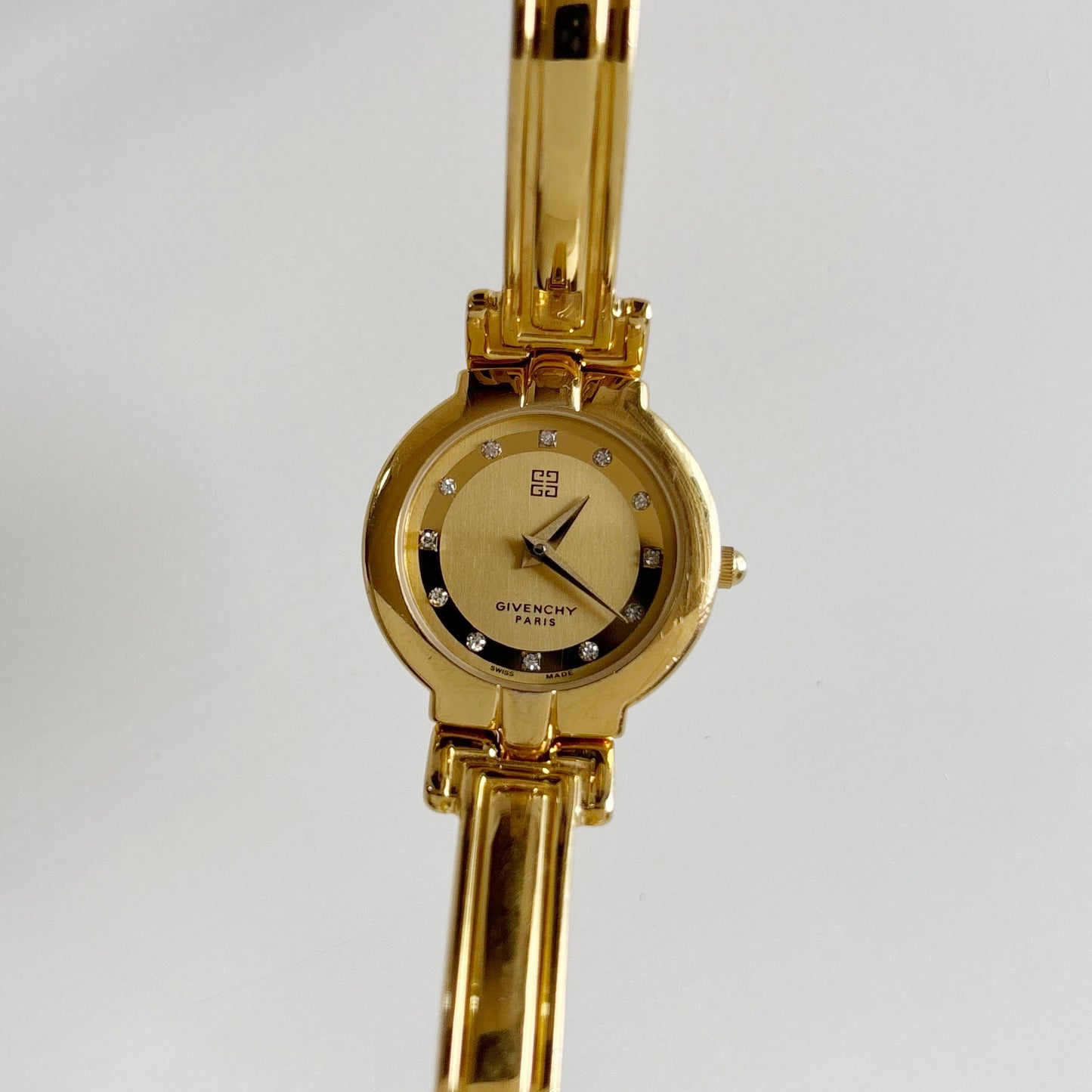 Givenchy 1990s Round Dial Gold Plated Bangle Watch