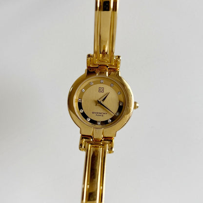 Givenchy 1990s Round Dial Gold Plated Bangle Watch