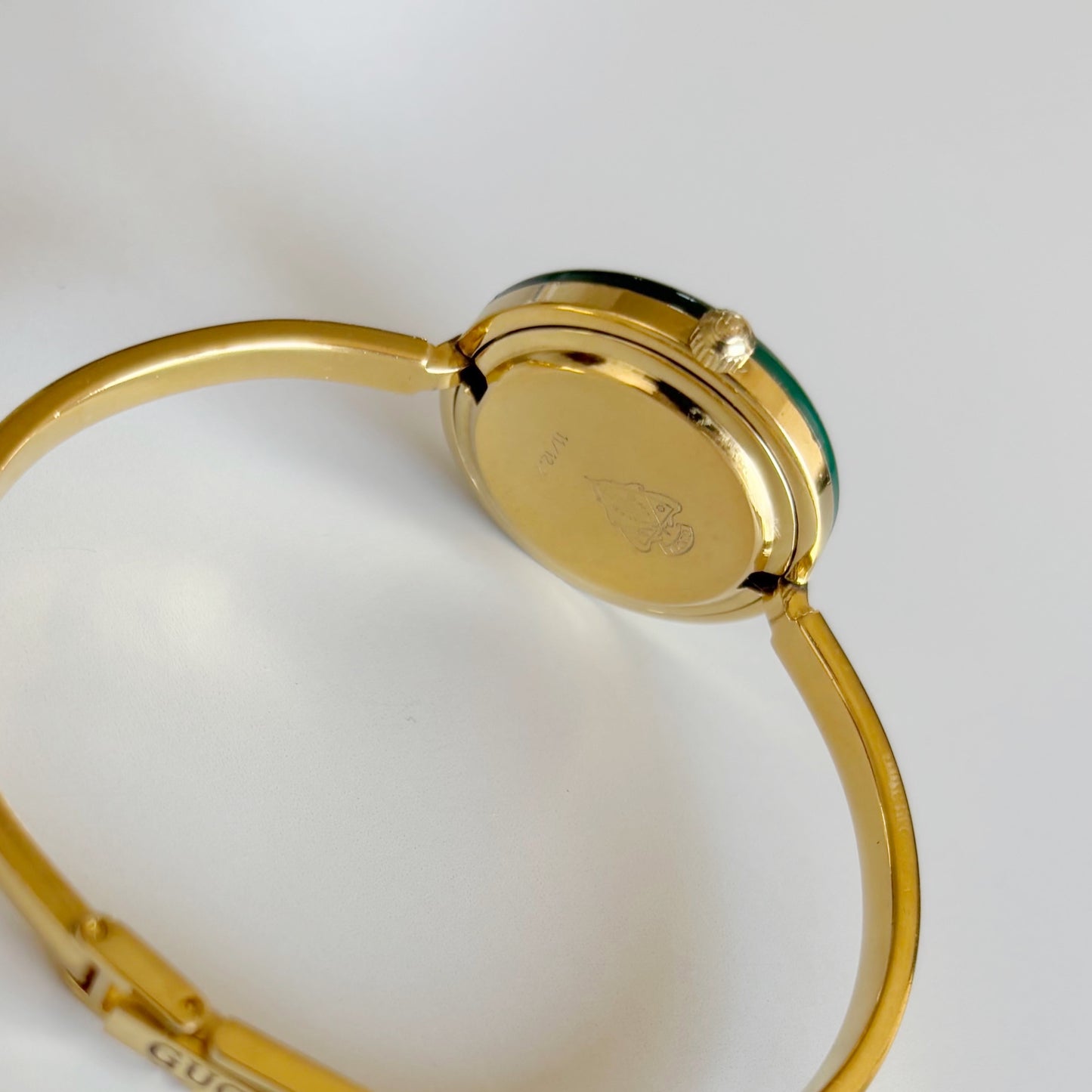 Gucci 1990s Interchangeable Bezel Gold Plated Bangle Watch with 12 bezels, case