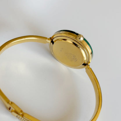 Gucci 1990s Interchangeable Bezel Gold Plated Bangle Watch with 12 bezels, case