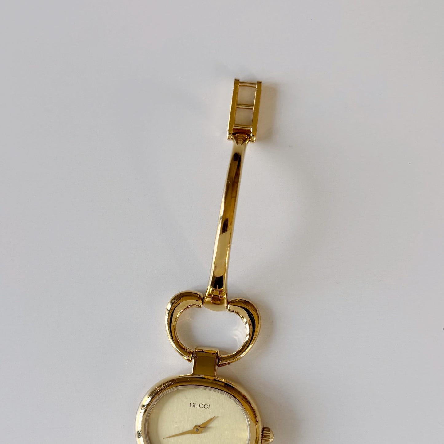 Gucci 1990s Oval Gold Dial Gold Plated Bangle Watch (Small)