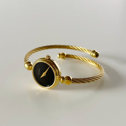 Gucci 1990s Black Dial Gold Plated Cable Bangle Watch