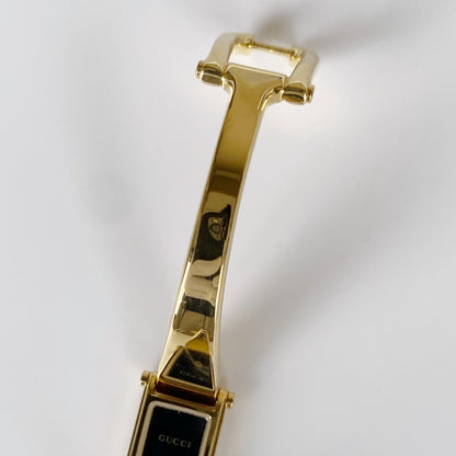 Gucci 1990s Black Dial Rectangular Gold Plated Bangle Watch