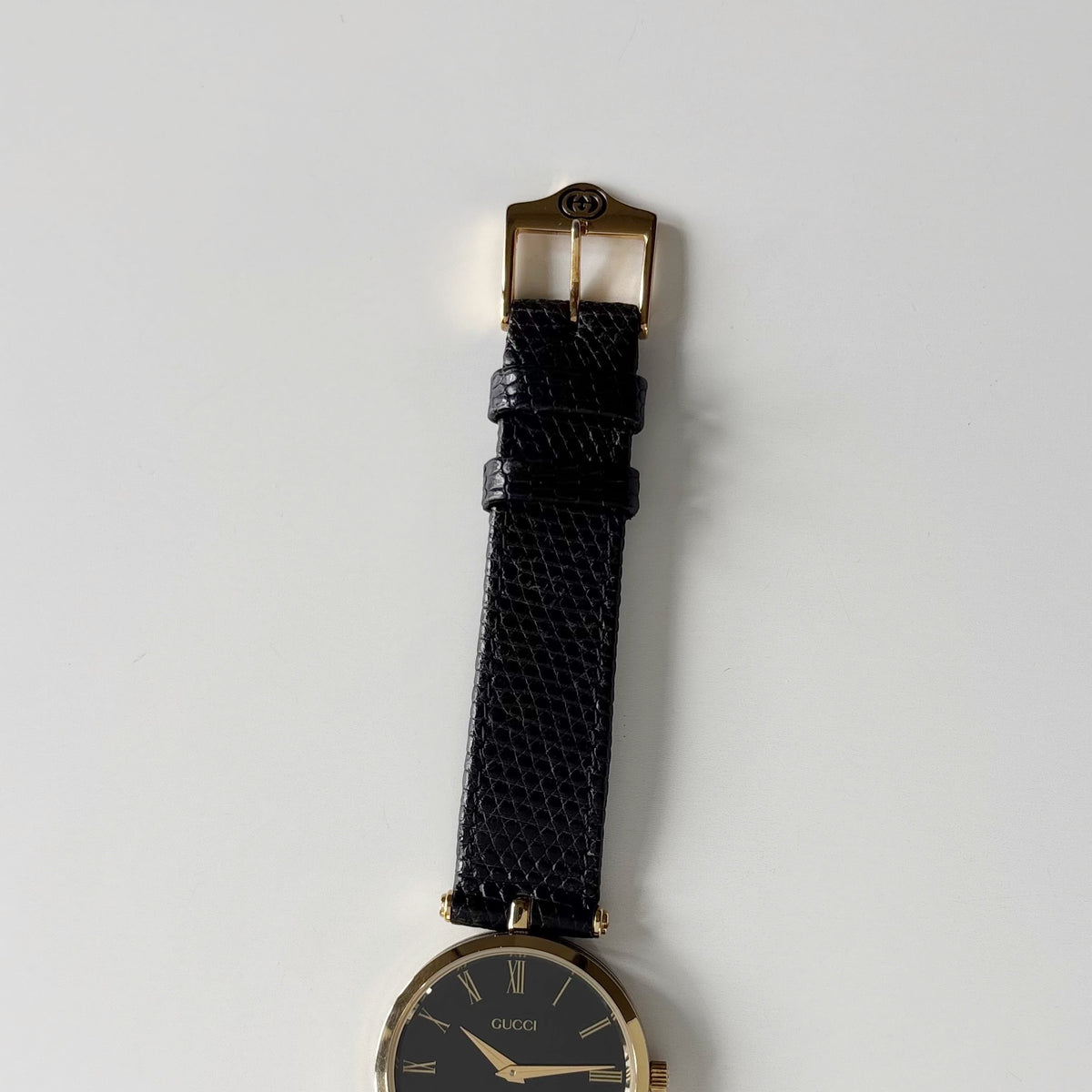 Gucci 1980s Round Black Dial Gold-Plated Watch (Large)