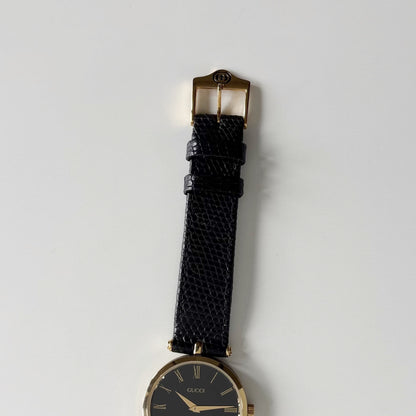 Gucci 1980s Round Black Dial Gold-Plated Watch (Large)