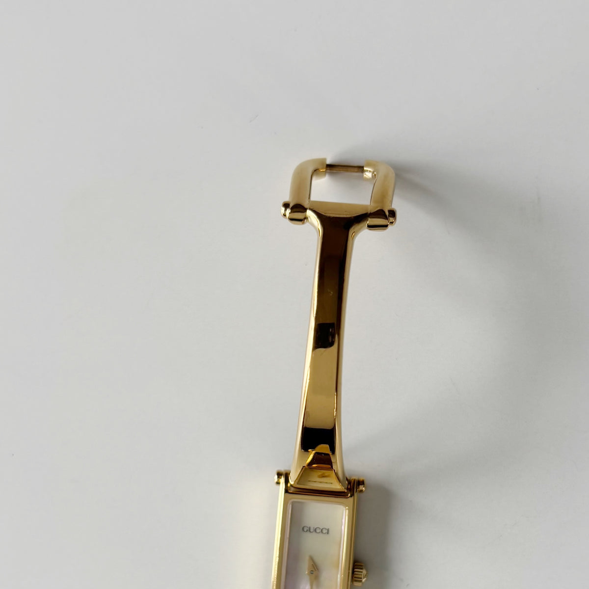 Gucci 1990s Seashell Rectangular Dial Gold Plated Bangle Watch