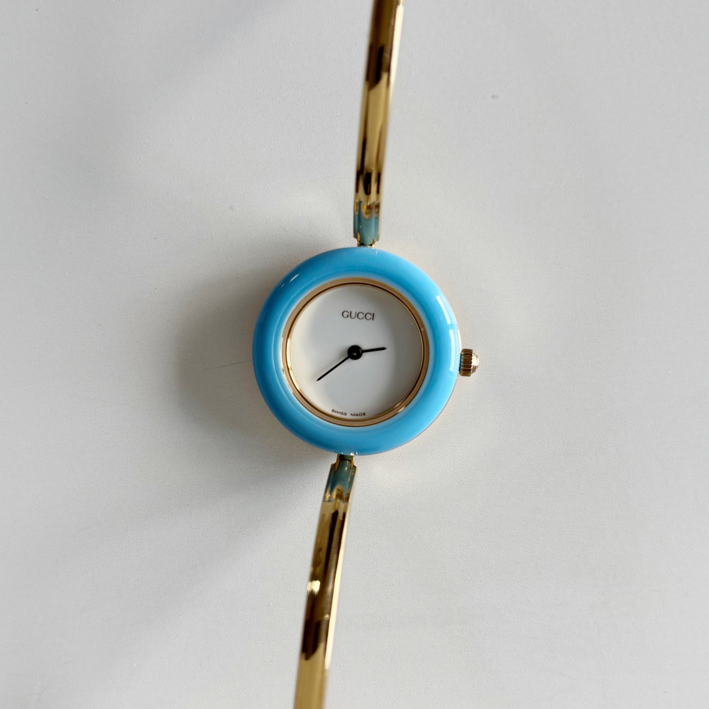 Gucci 1990s Interchangeable Bezel Gold Plated Bangle Watch with 12 bezels, case