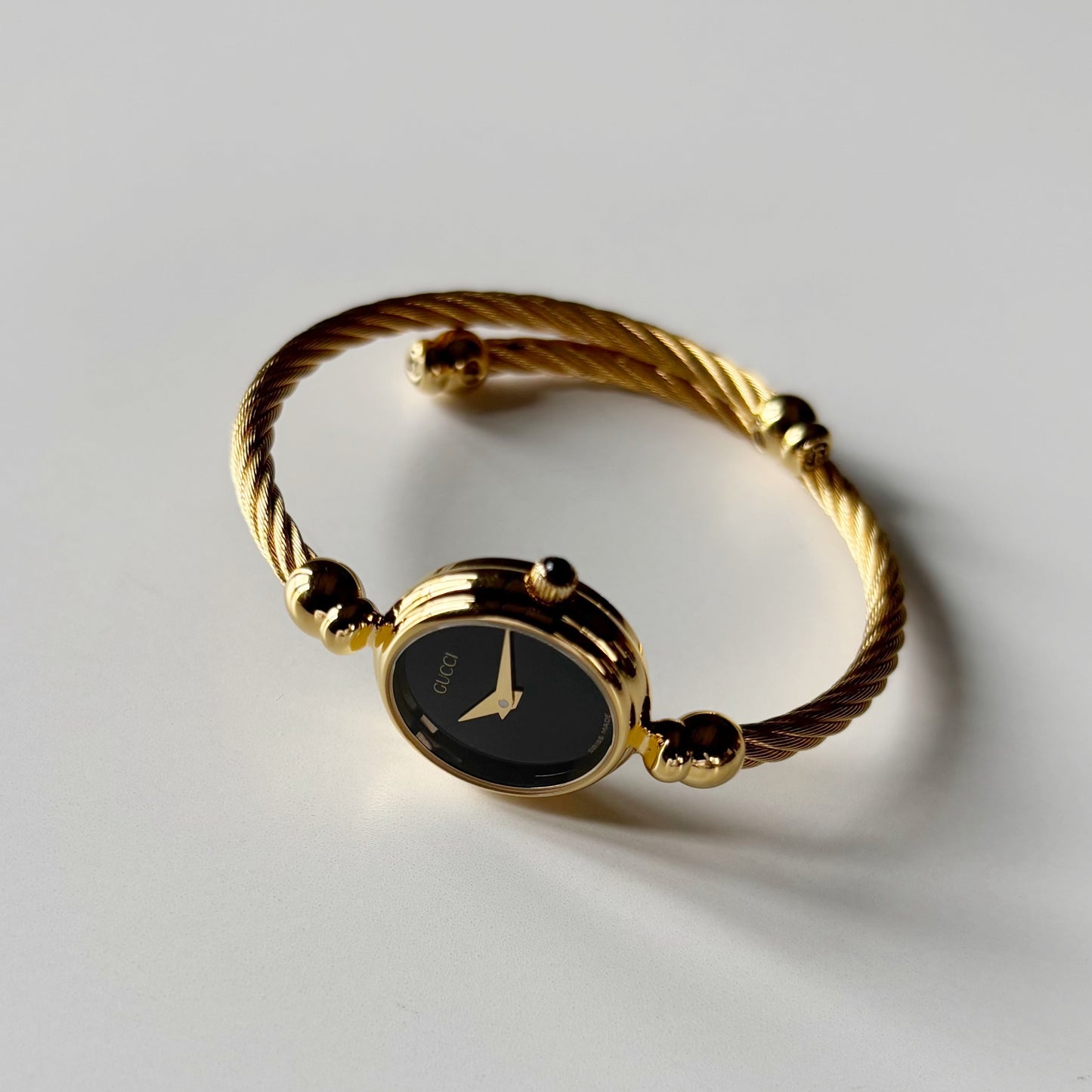 Gucci 1990s Black Dial Gold Plated Cable Bangle Watch