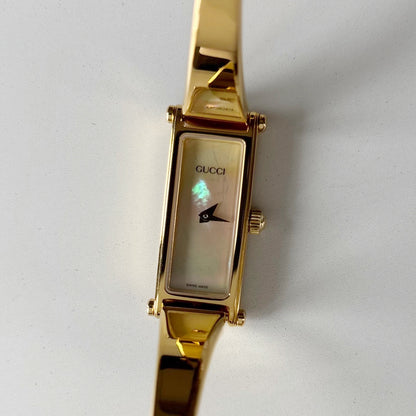Gucci 1990s Seashell Rectangular Dial Gold Plated Bangle Watch