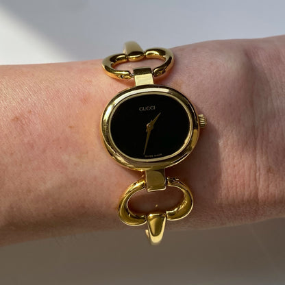 Gucci 1990s Black Dial Gold Plated Bangle Watch