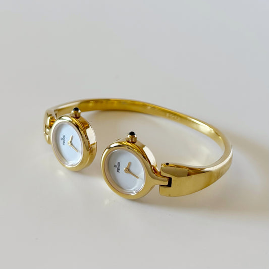 Fendi 1990s Seashell Dial Two Time Zone Gold Plated Bangle Watch