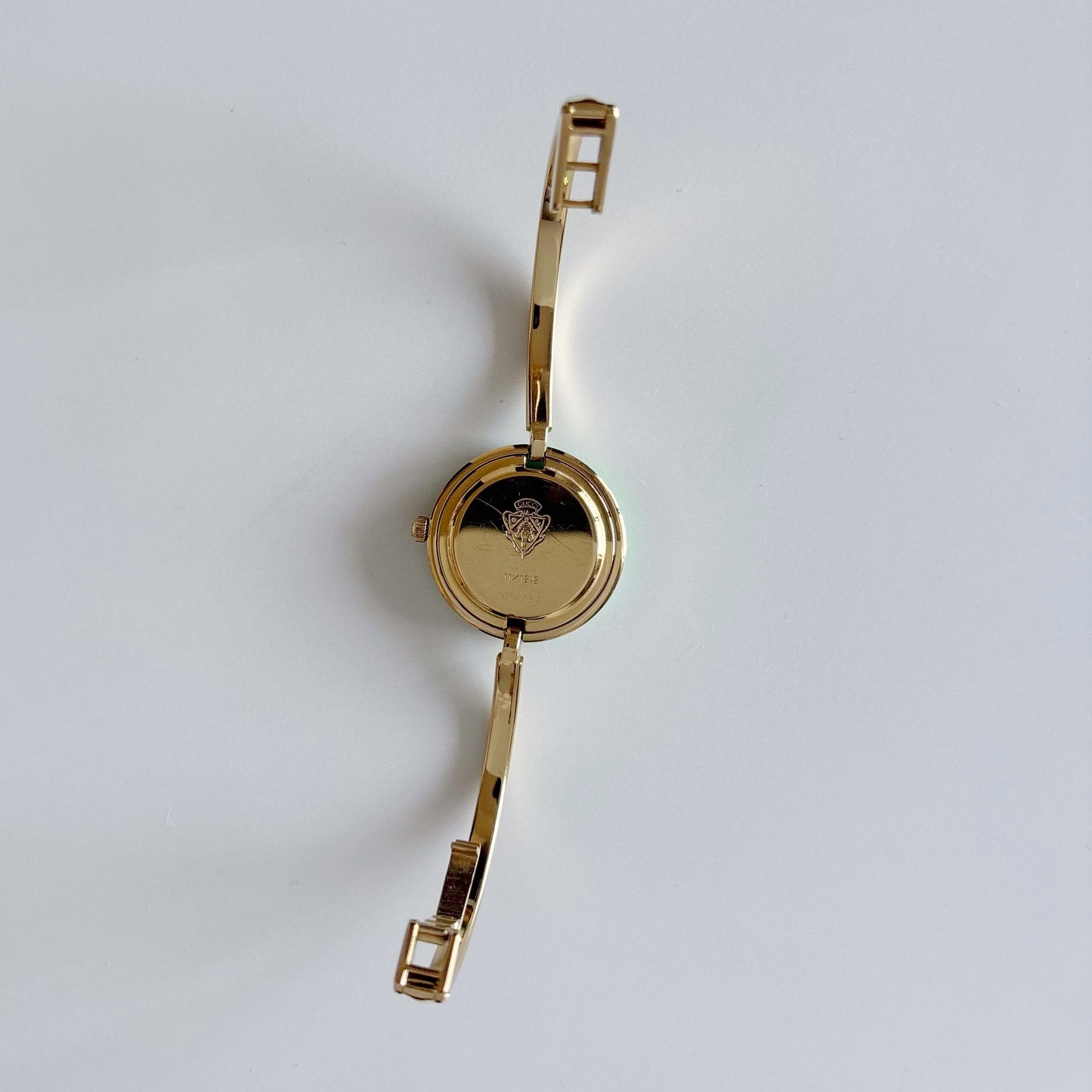 Gucci 1990s Interchangeable Bezel Gold Plated Bangle Watch with 12 bezels, case