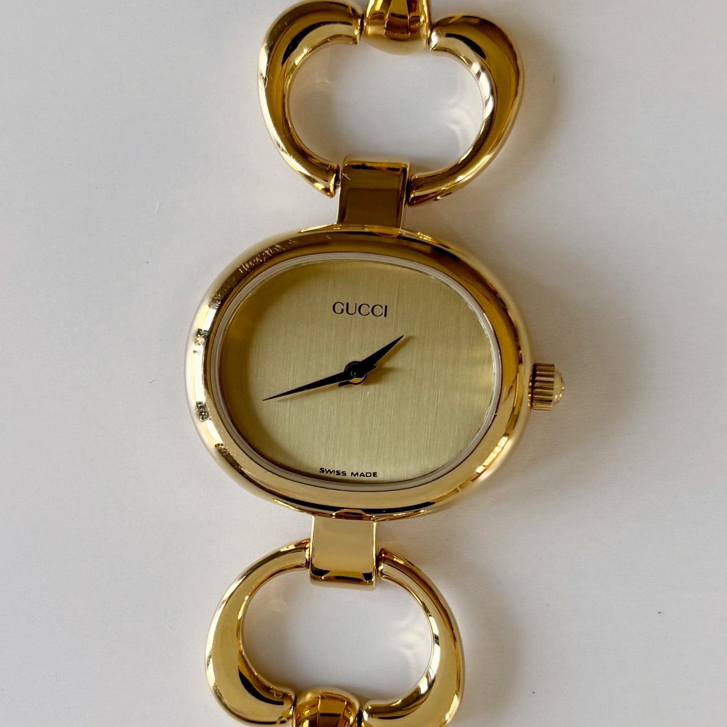 Gucci 1990s Oval Gold Dial Gold Plated Bangle Watch (Small)