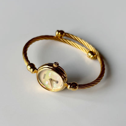 Gucci 1990s Seashell Dial Gold Plated Cable Bangle Watch