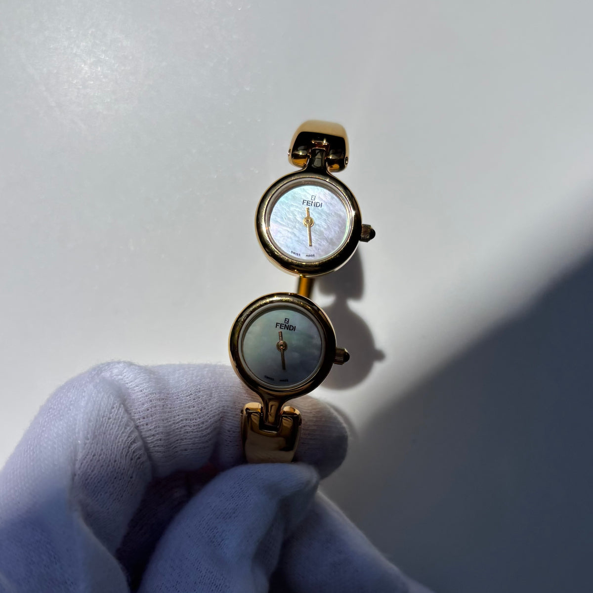 Fendi 1990s Seashell Dial Two Time Zone Gold Plated Bangle Watch