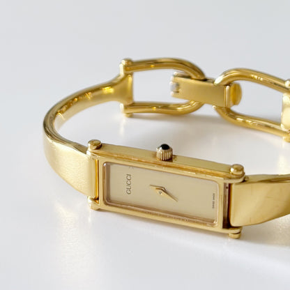 Gucci 1990s Gold Dial Gold Plated Bangle Watch