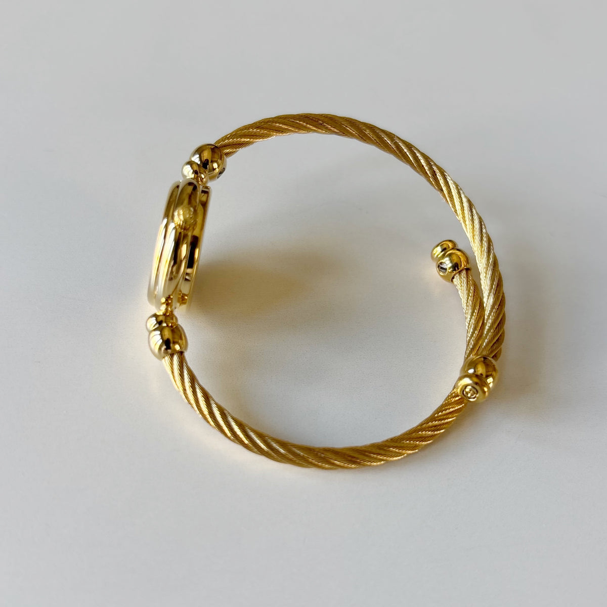 Gucci 1990s Black Round Dial Cable Gold-Plated Bangle Watch